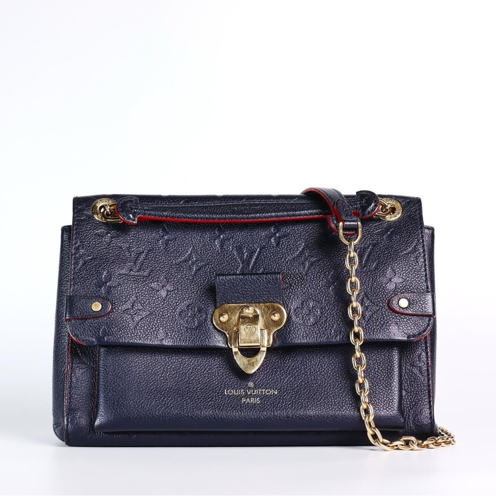 Pre-Owned Louis Vuitton Vavin PM bag in the Monogram Empreinte Marine Rouge